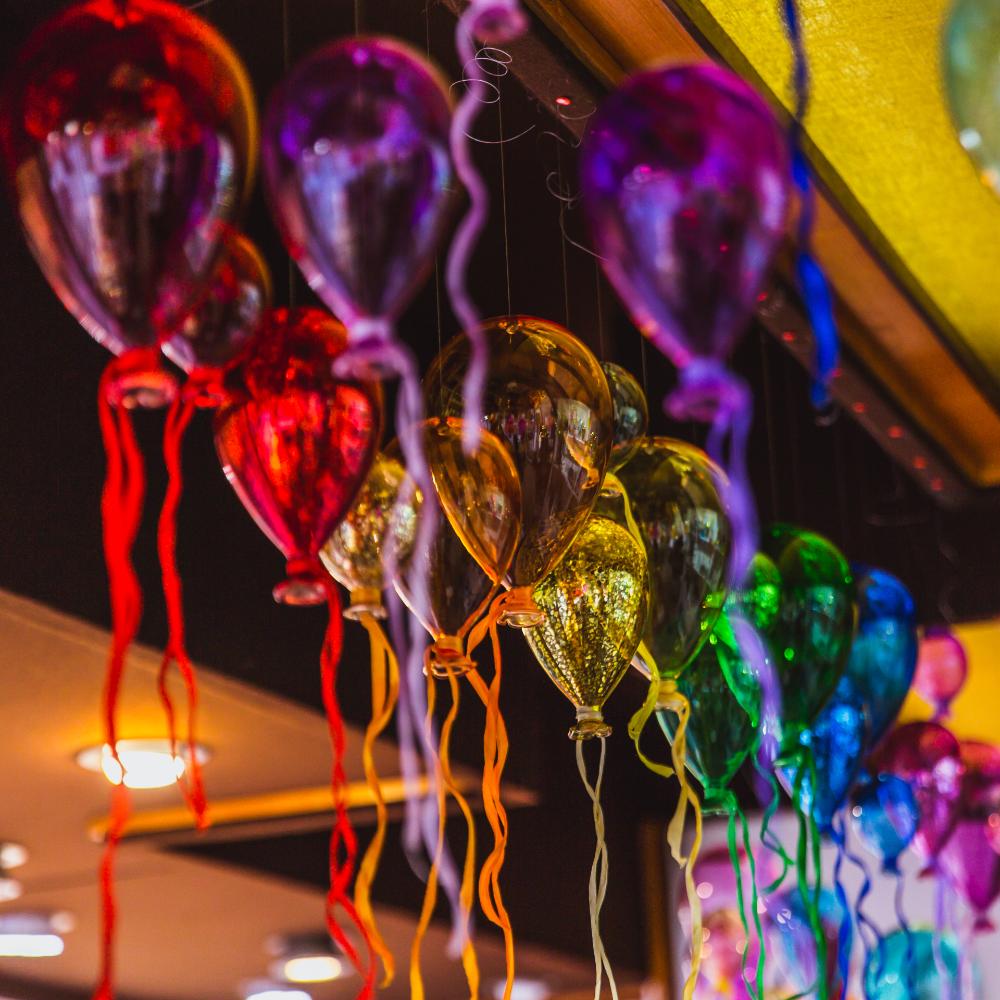 moulticoloured group of glass balloons in a shop o 2023 11 27 05 04 26 utc.jpg